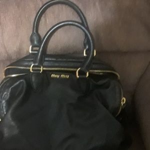 Large leather miu miu in excellent  condition purs